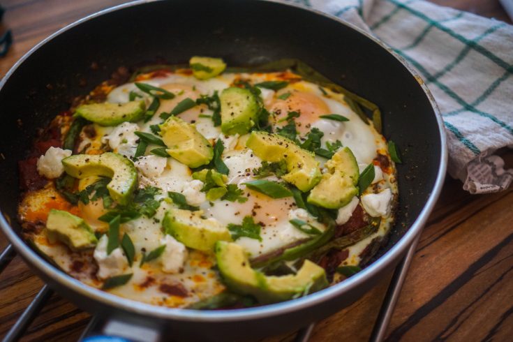 Spicy Shakshuka with Goat Cheese, Avocado & Green Onion