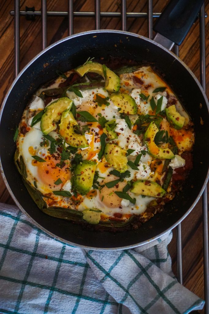 Spicy Shakshuka with Green Onion, Goat Cheese, & Avocado