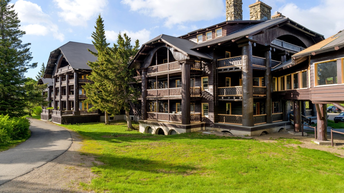 East Glacier Park, Montana, USA - June 6, 2021: Spring morning view of south addition building of Glacier Park Lodge, built by Great Northern Railway in 1913, at just outside of Glacier National Park.