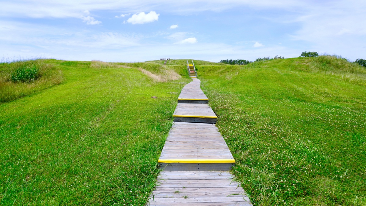 Poverty Point World Heritage Site in Louisiana is a prehistoric monumental earthworks site constructed by the Poverty Point culture. Boardwalk stairs climbing the largest earthen mound - Mound A.