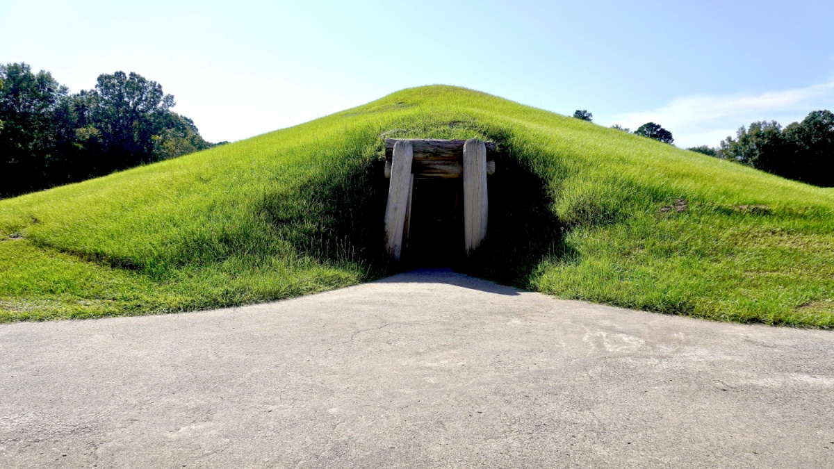 Macon, GA - 2021: Ocmulgee Mounds National Historical Park preserves earthworks built by South Appalachian Mississippian culture. Entrance to circular earth lodge built for meetings and ceremonies.