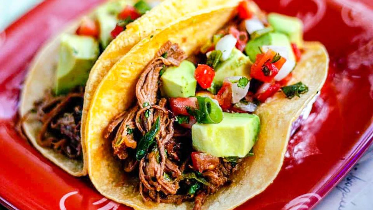Shredded Beef Tacos with Avocado and Lime.
