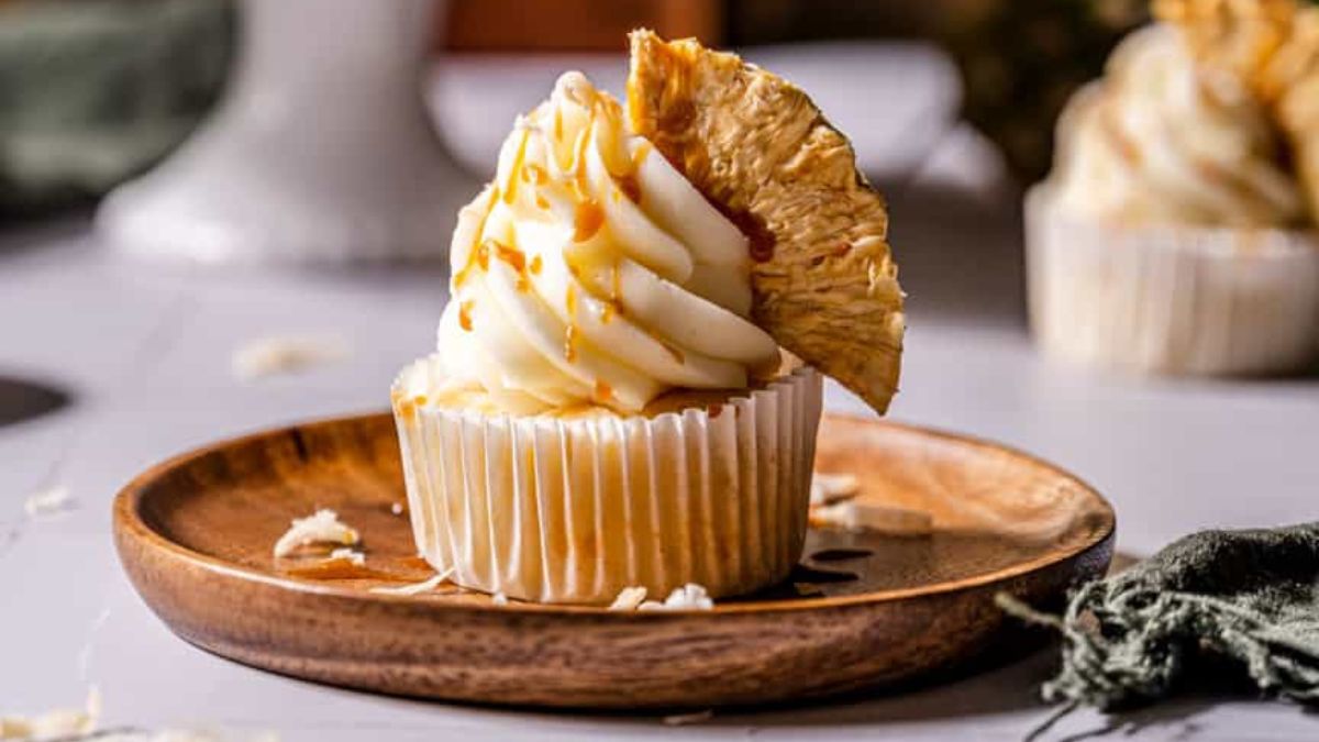 Piña Colada Cupcakes with Salted Caramel Rum Sauce.