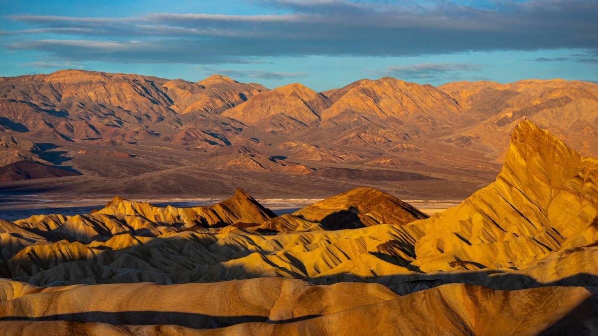 colorful sunrise in zabriskie point, death valley national park, california, usa; colorful mountains on the desert.