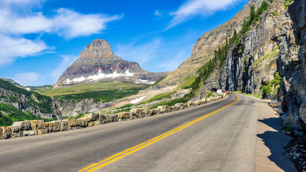 Panoramic view of Going-To-The-Sun road in Glacier National Park, Montana with Clements Mountain and the East Side tunnel in the background.