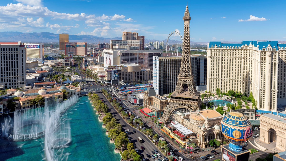 LAS VEGAS, USA - JUNE 4, 2023: World famous Las Vegas Strip in Las Vegas, Nevada at sunny day on June 4, 2023 in Las Vegas, USA. The Strip is home to the largest hotels and casinos in the world.