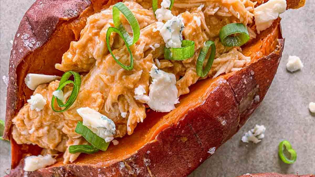 Slow Cooker Buffalo Chicken Stuffed Sweet Potatoes.