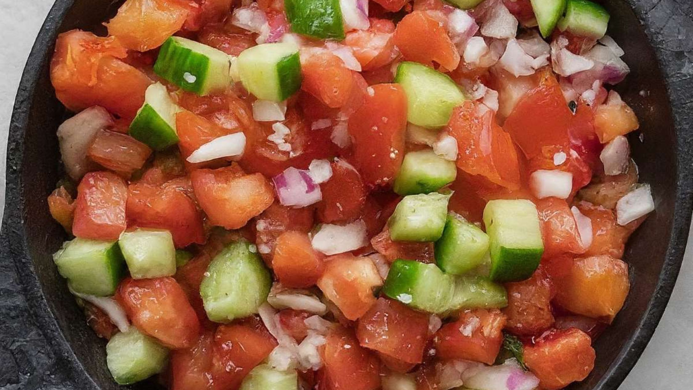 Cucumber Tomato And Onion Salsa With Jalapenos.