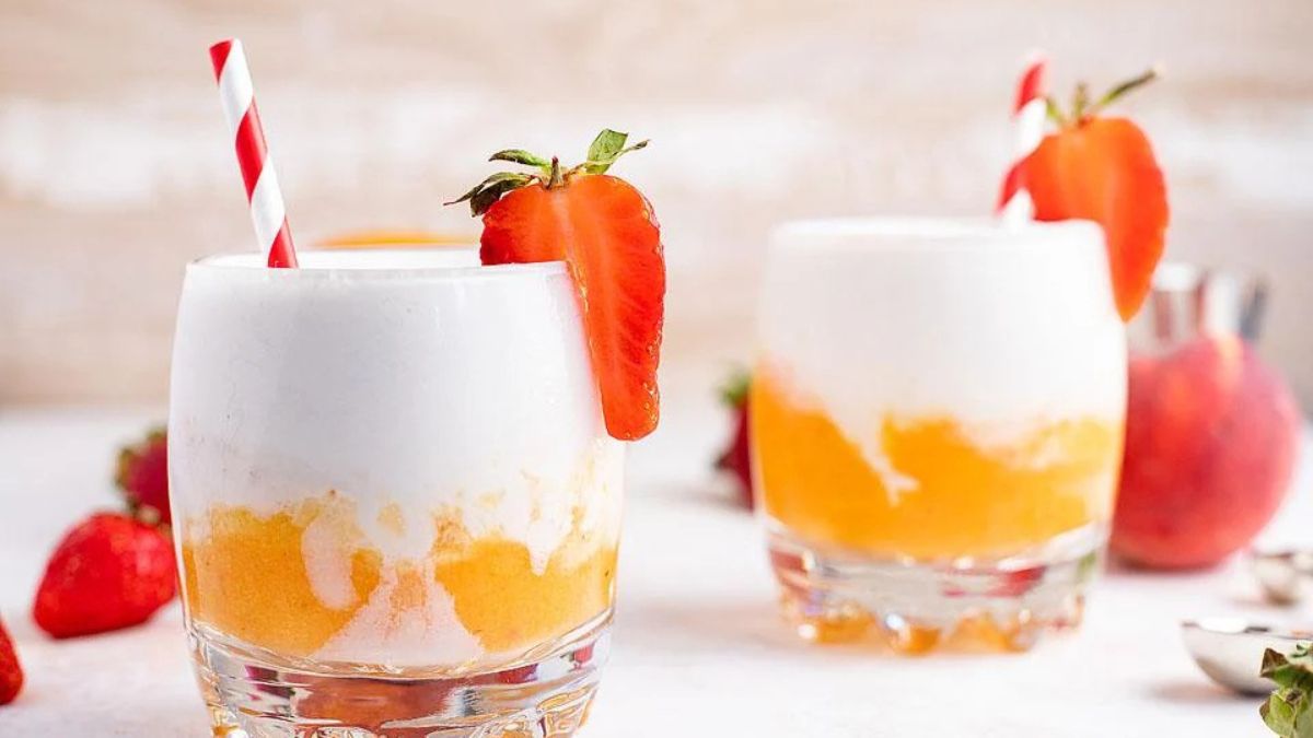 Layered Coconut Mango Tropical Rum Slushie.