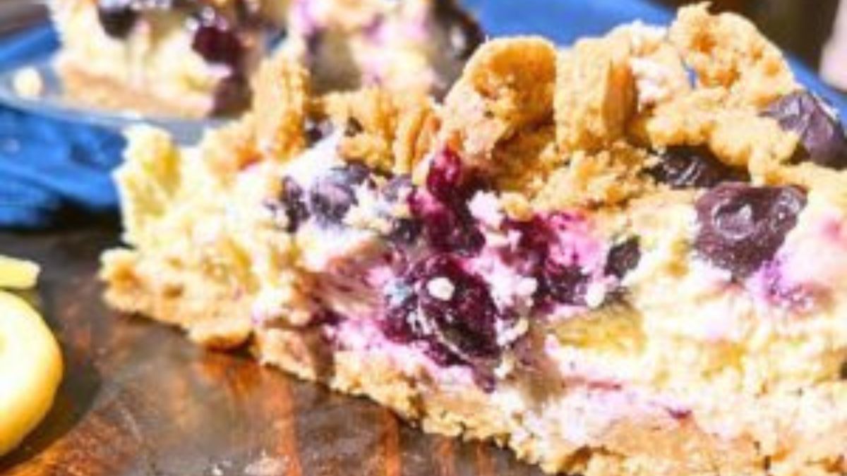 Loaded Lemon Blueberry Crisp Cheesecake.