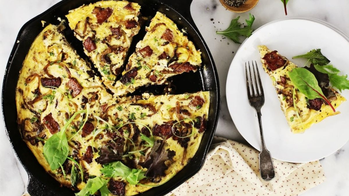 Potato-Crusted Sausage Quiche with Caramelized Onions and Gruyere.
