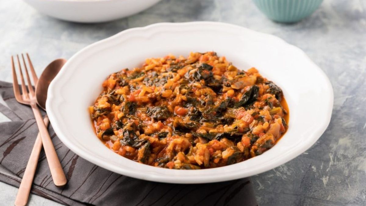 Red Spanakorizo: Greek Spinach and Rice with Tomatoes.