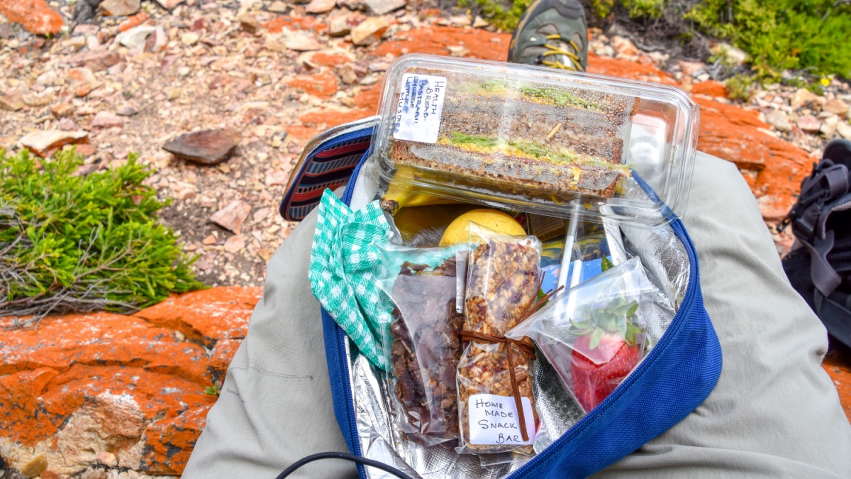 Hikers pack with food items in the dunes near the Indian Ocean seen from the Oyster Catcher Trail near Mosselbay on the Garden Route in South Africa popular with tourists.