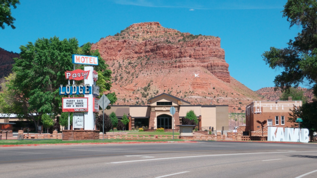 Kanab, Utah, USA on July 16, 2023 : Parry lodge sign, the mountain and Kanab sign.