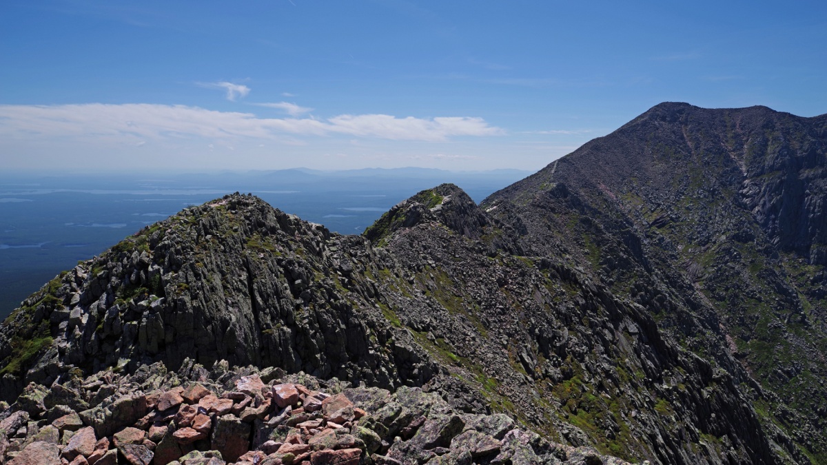 Mount Katahdin's Knife Edge descends from Baxter Peak on this beautiful summer day in Maine.