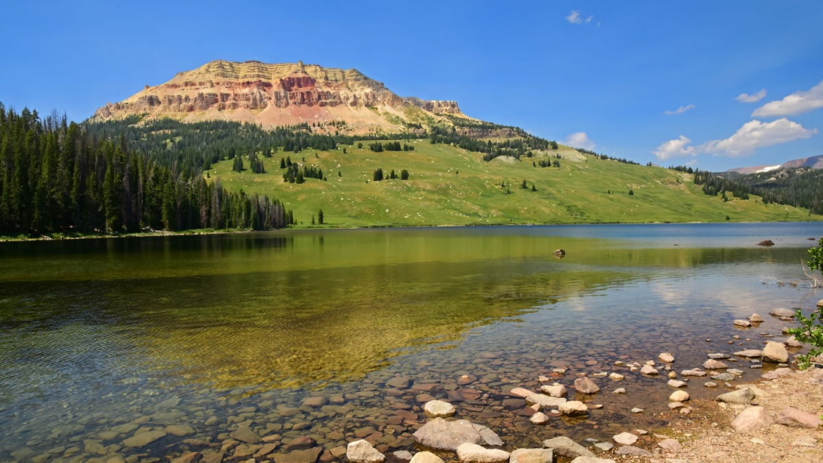 beautiful beartooth lake and beartooth butte on a sunny summer day along the beartooth highway, a national scenic byway in wyoming.