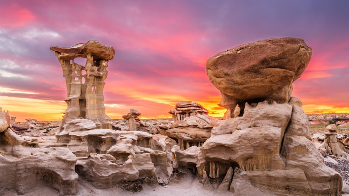 Bisti/De-Na-Zin Wilderness, New Mexico, USA at the Alien Throne rock formation just after sunset.