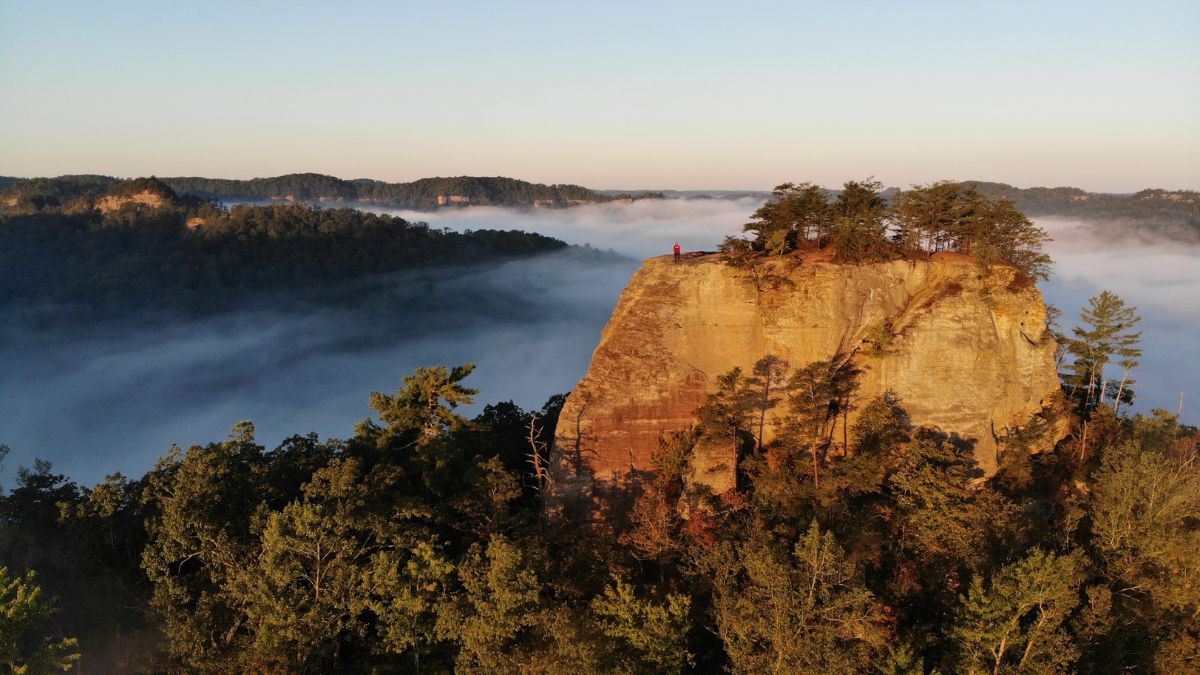 Courthouse Rock of the Red River Gorge in Kentucky on a foggy sunrise.
