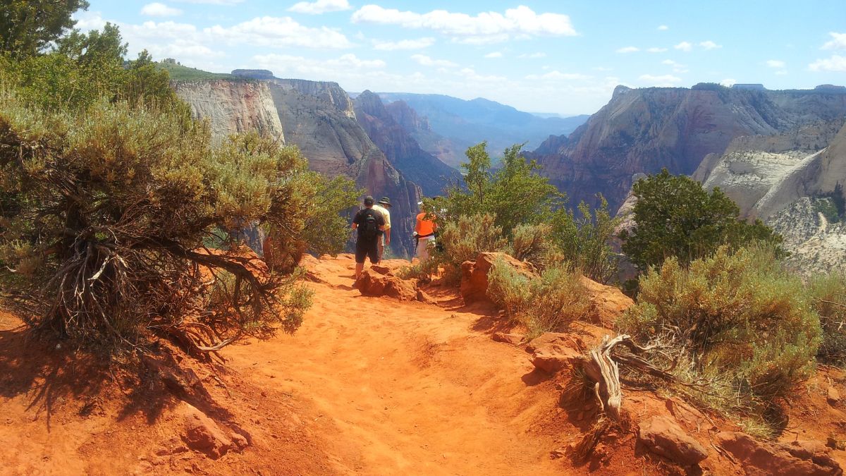 Hikers enjoying view at Observation Point, Zion National Park, Utah.