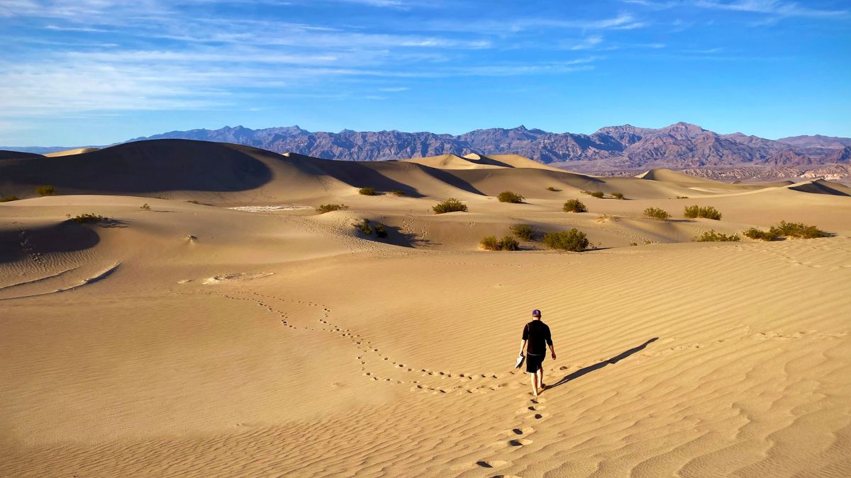 Hiking through the Mesquite Flat Sand Dunes in Death Valley National Park.