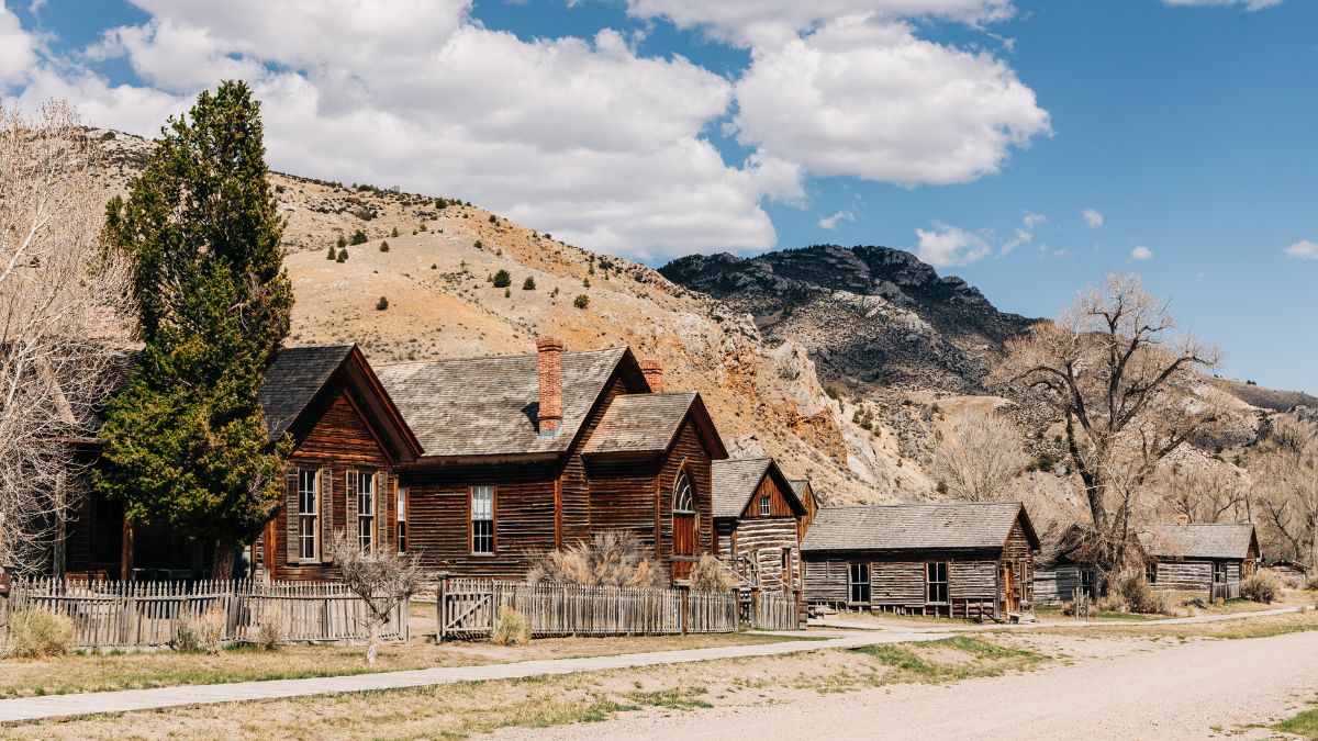 BANNACK, MONTANA - MARCH 29, 2024: Bannack State Park street view with vintage wood buildings.