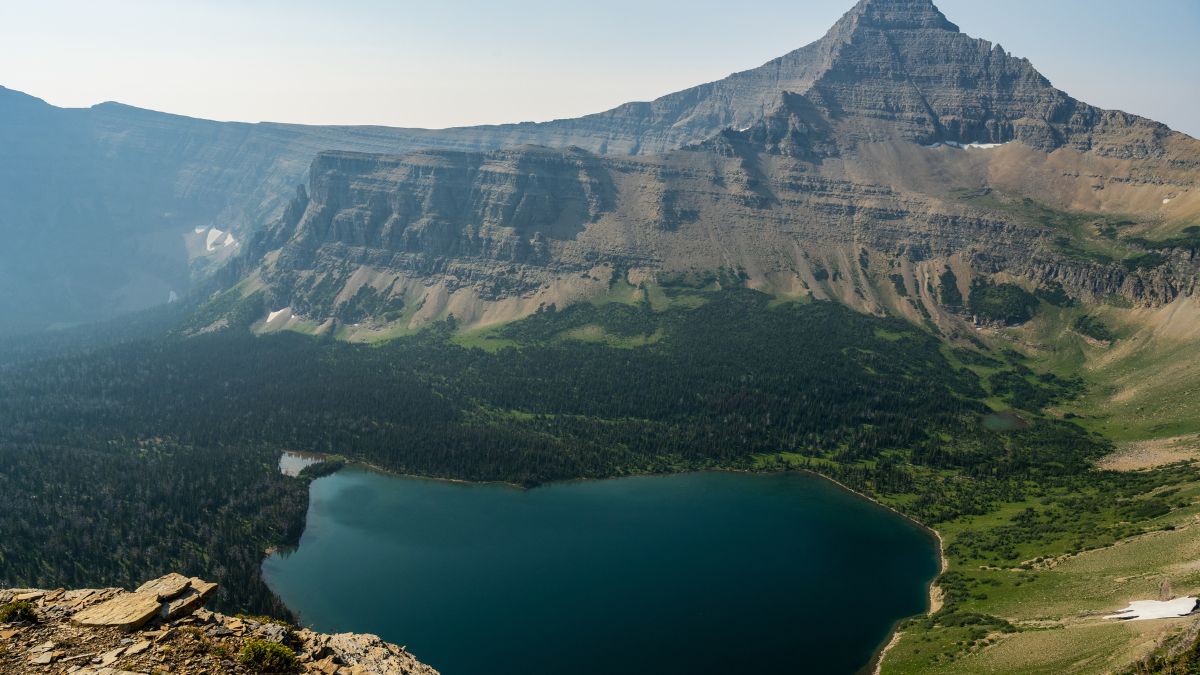 Old Man Lake Sits Below Flinsch Peak in Glacier National Park.