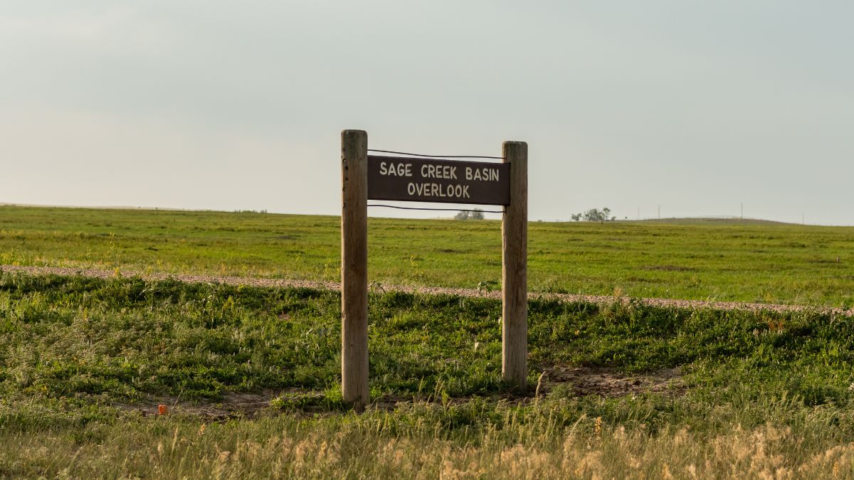 Sage Creek Basin Overlook Sign in Badlands.