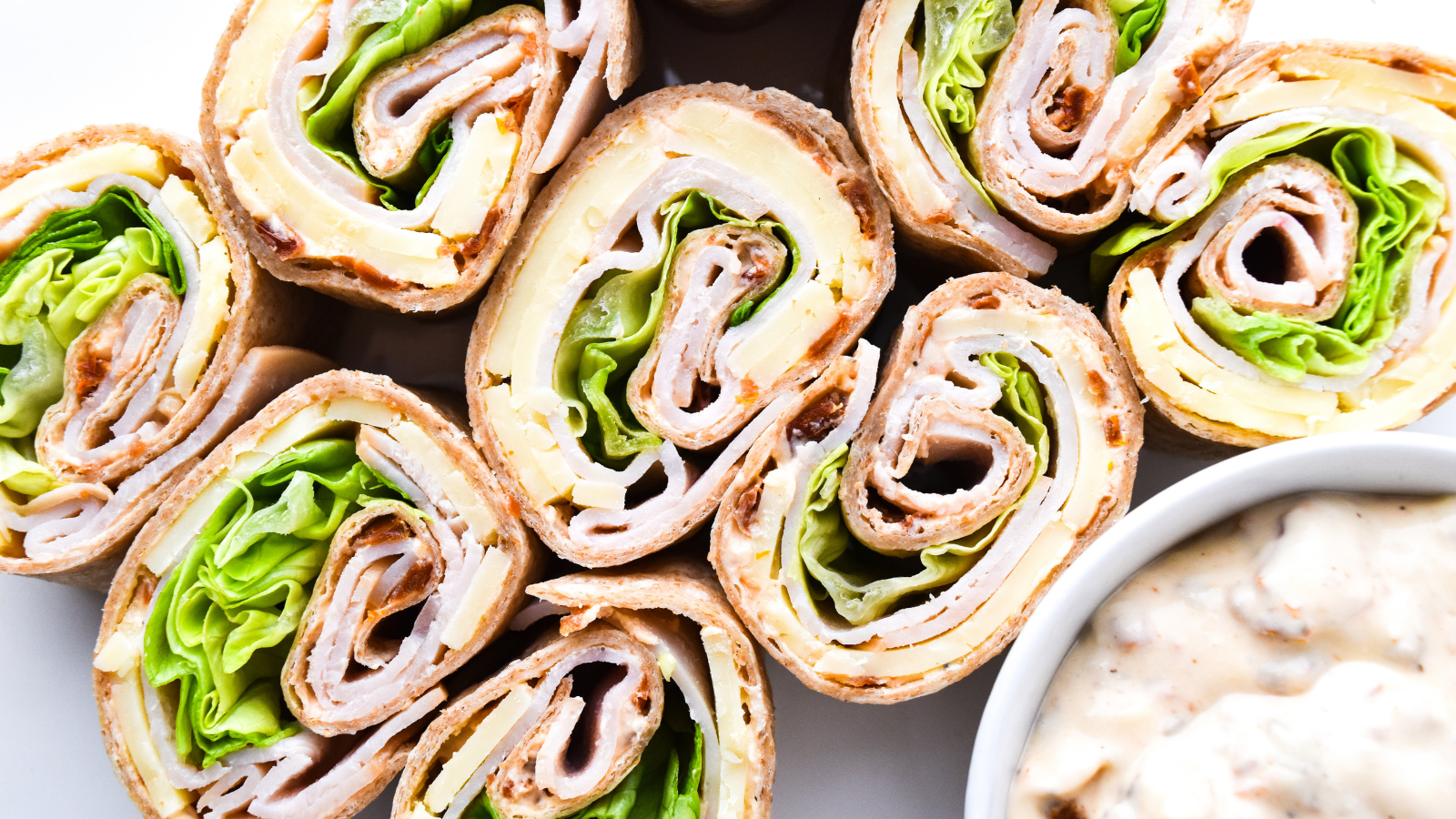 Sun-Dried Tomato + Turkey Pinwheel Sandwiches.