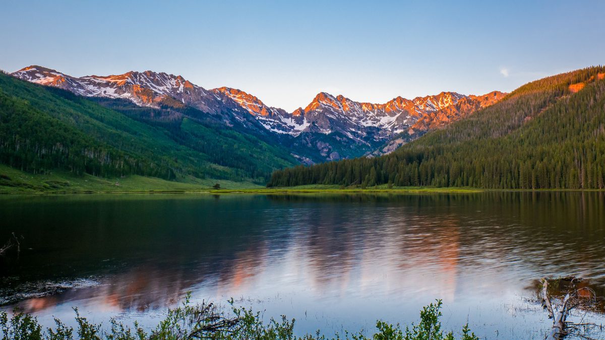 Sunset over the Gore Range at Piney Lake Vail, Colorado.