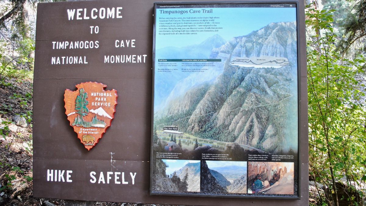 Timpanogos, Utah - 2015: National Park Service sign reads "Welcome to Timpanogos Cave National Monument." Mount Timpanogos overlooks Utah Valley and is the second highest mountain in the Wasatch Range.