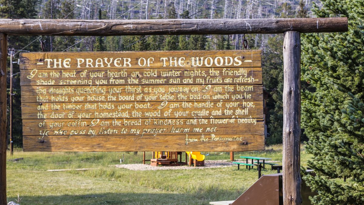 Cooke City-Silver Gate, Montana, United States - August 20, 2017: Wooden sign with "The Prayer of the Woods" along the Beartooth Highway.