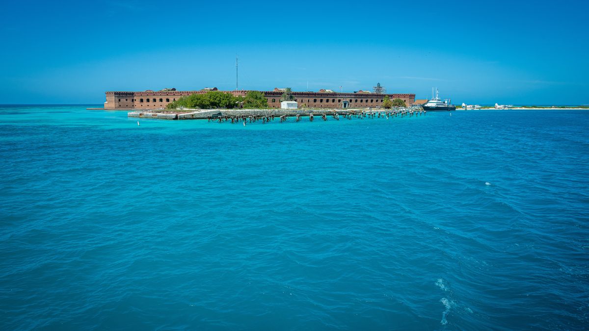 Dry Tortguas National Park, United States March 12, 2020 Dry Tortugas National Park with Blue Water Foreground on calm day.