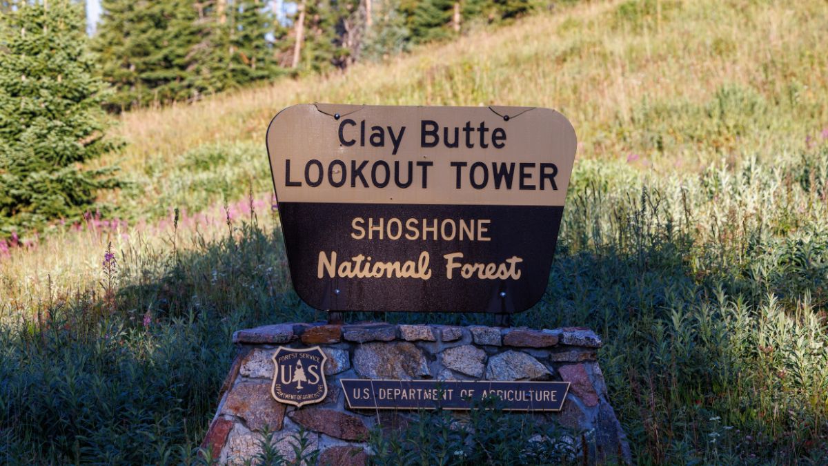 Park County, WY, USA - August 15, 2024: Clay Butte Lookout Tower sign near scenic Beartooth Highway 212.
