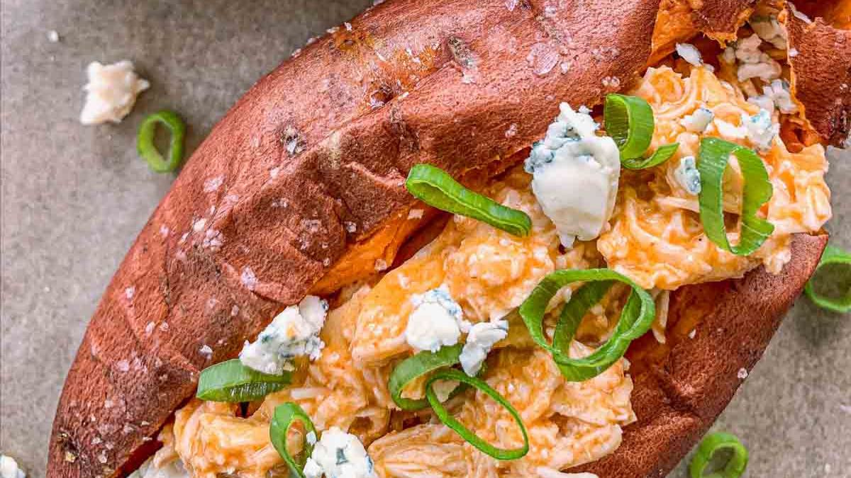 Slow Cooker Buffalo Chicken Stuffed Sweet Potatoes.