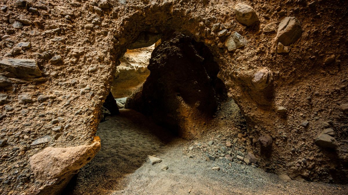 Small Arching Doorway In Sidwinder Slot Canyon in Death Valley National Park.