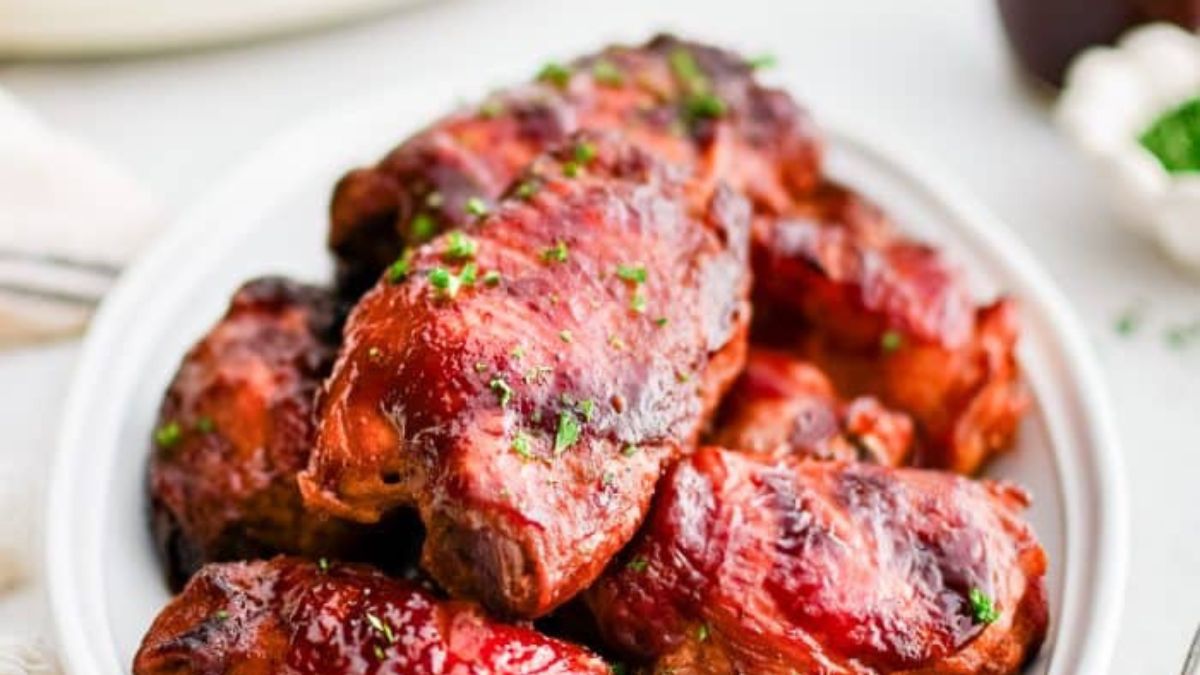 Super Easy Slow Cooker BBQ Chicken Thighs.