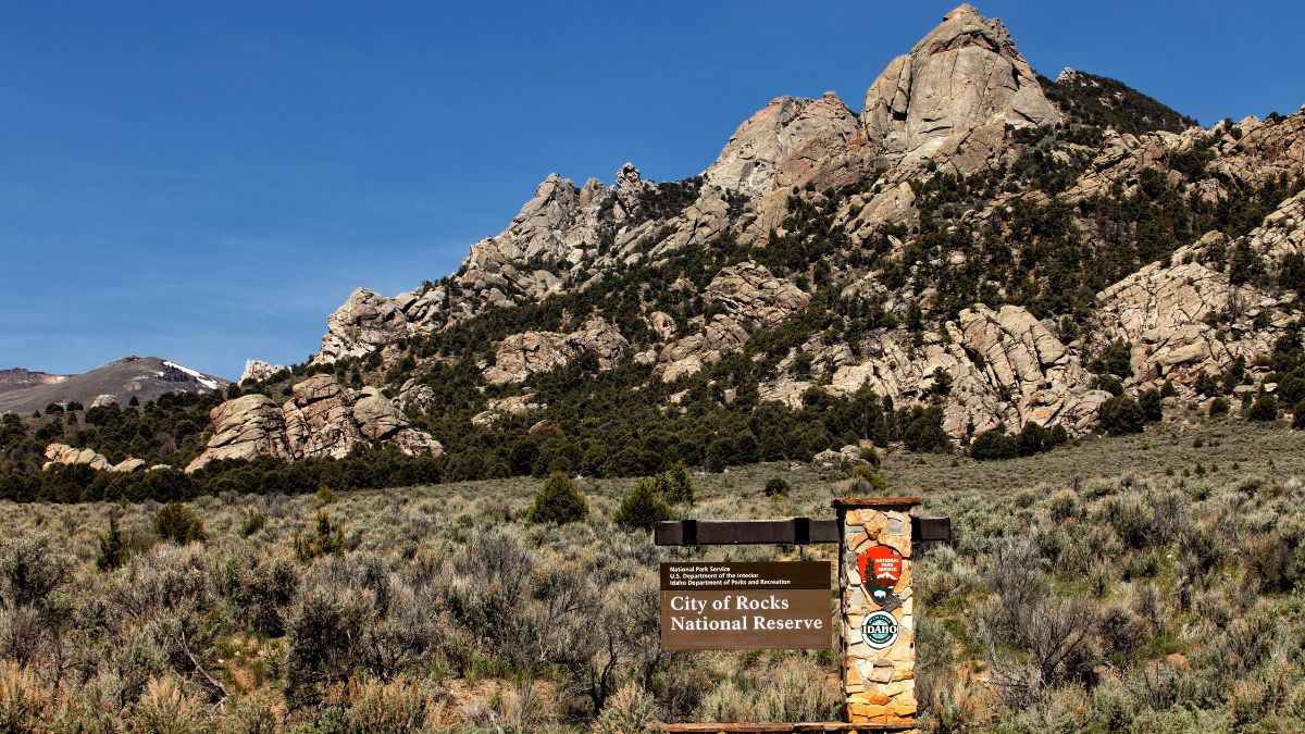 The front entrance sign and granite formations in the City of Rocks National Reserve near Oakley, Idaho.