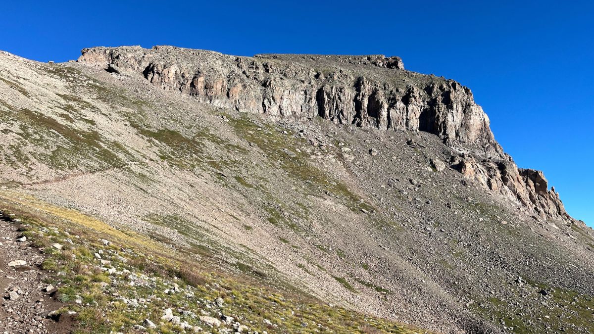 Uncompahgre Peak, Colorado 14er, San Juan Mountains, alpine hike, mountain climbing, scenic trail, high altitude, summer hiking, rugged terrain, wilderness adventure, rocky summit, alpine landscape.