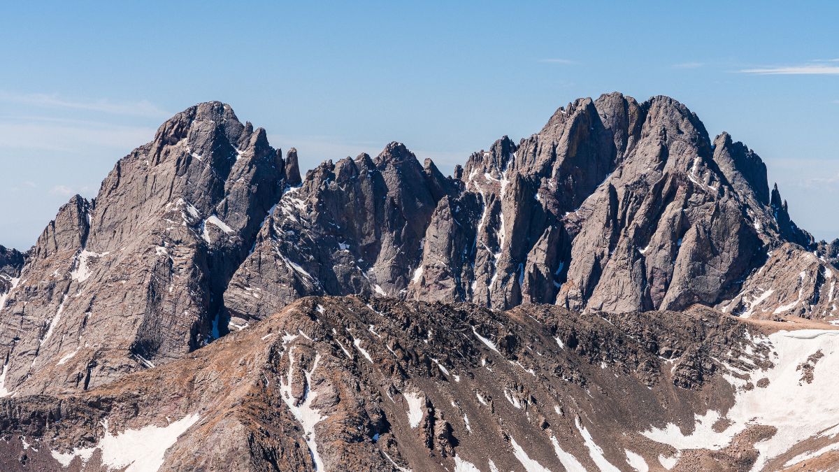 View of the Crestones, Crestone Needle and Crestone Peak, from the summit of Colony Baldy. Sangre de Cristo Range, Colorado Rocky Mountains.	
