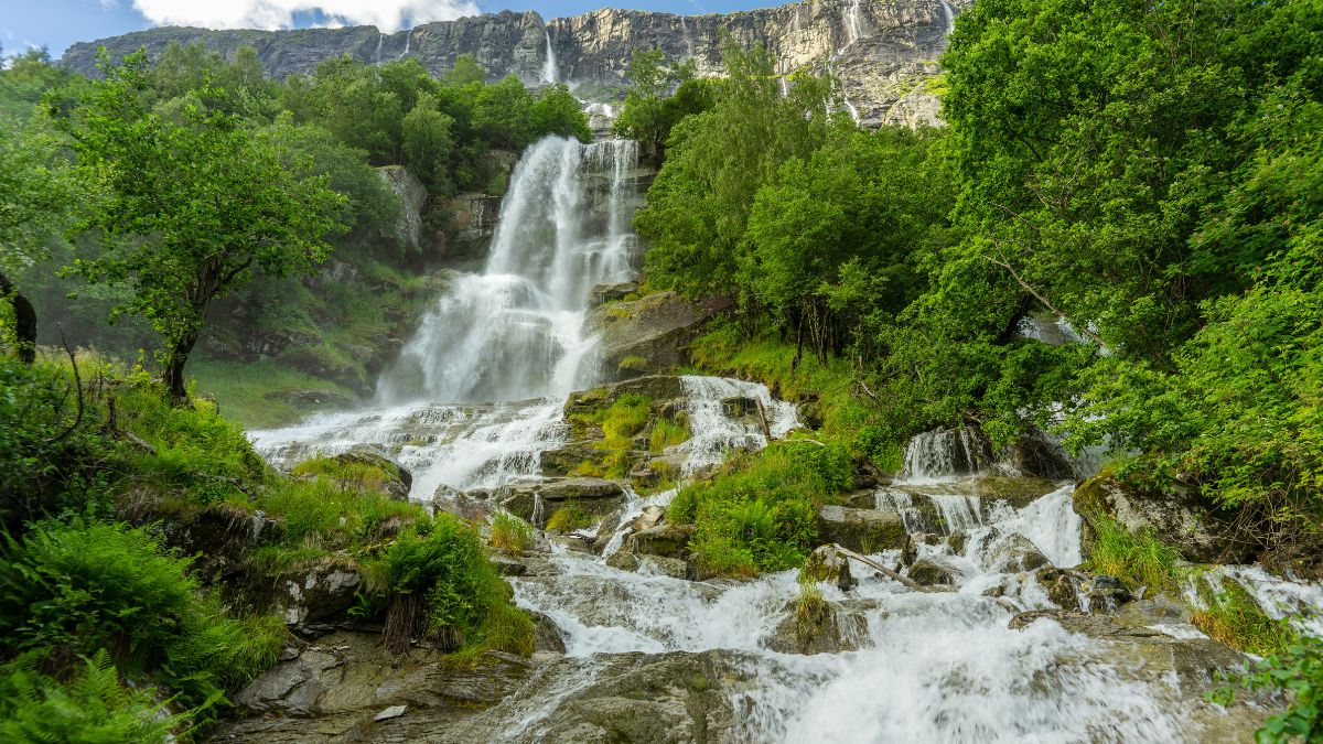 Vinnufossen, a beautiful waterfall flushing down a mountainside in Sunndal, Norway. The tallest waterfall in Europe and the sixth tallest in the world. 865m or 2 838 ft.