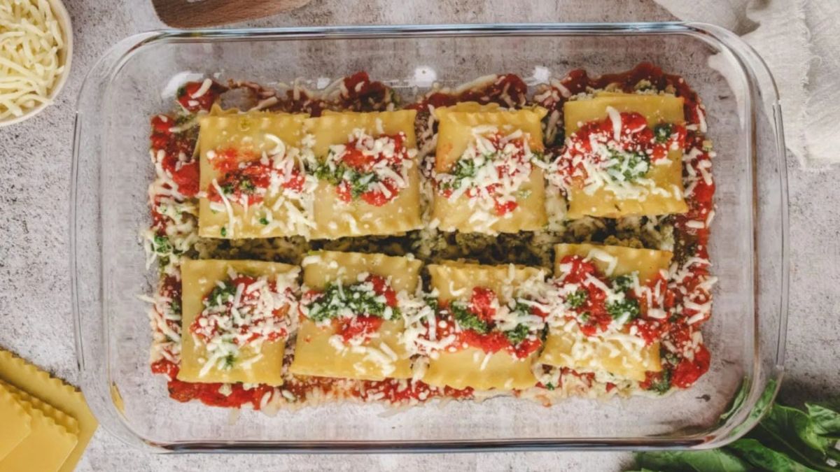 Chicken Pesto Lasagna Roll Ups with Tomato Sauce.